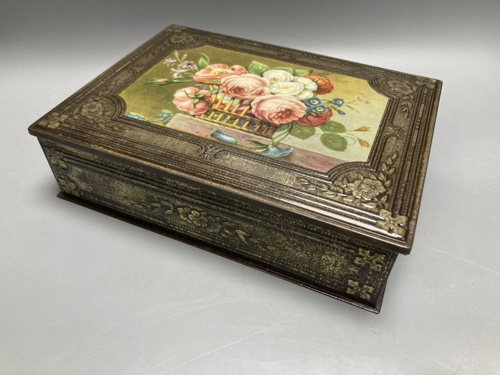 A Burmese red lacquered cylindrical box and a William Crawford biscuit tin (2)